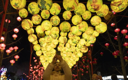 China’s Central Bank Governor Says Stable Yuan Key to Global Financial Stability