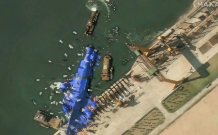 North Korea deploys mystery balloon-like objects to stricken warship, satellite photos show