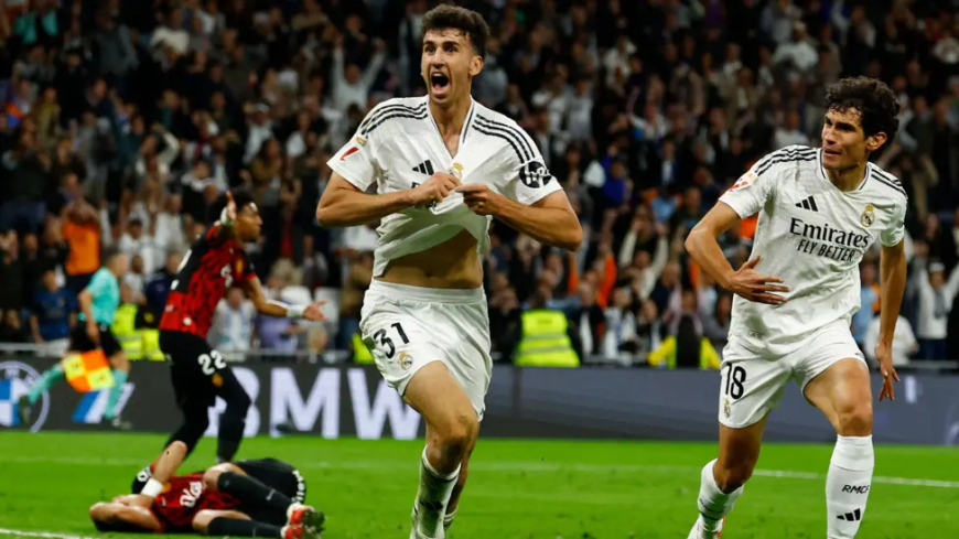 Real Madrid score stoppage-time winner to make Barca wait for title