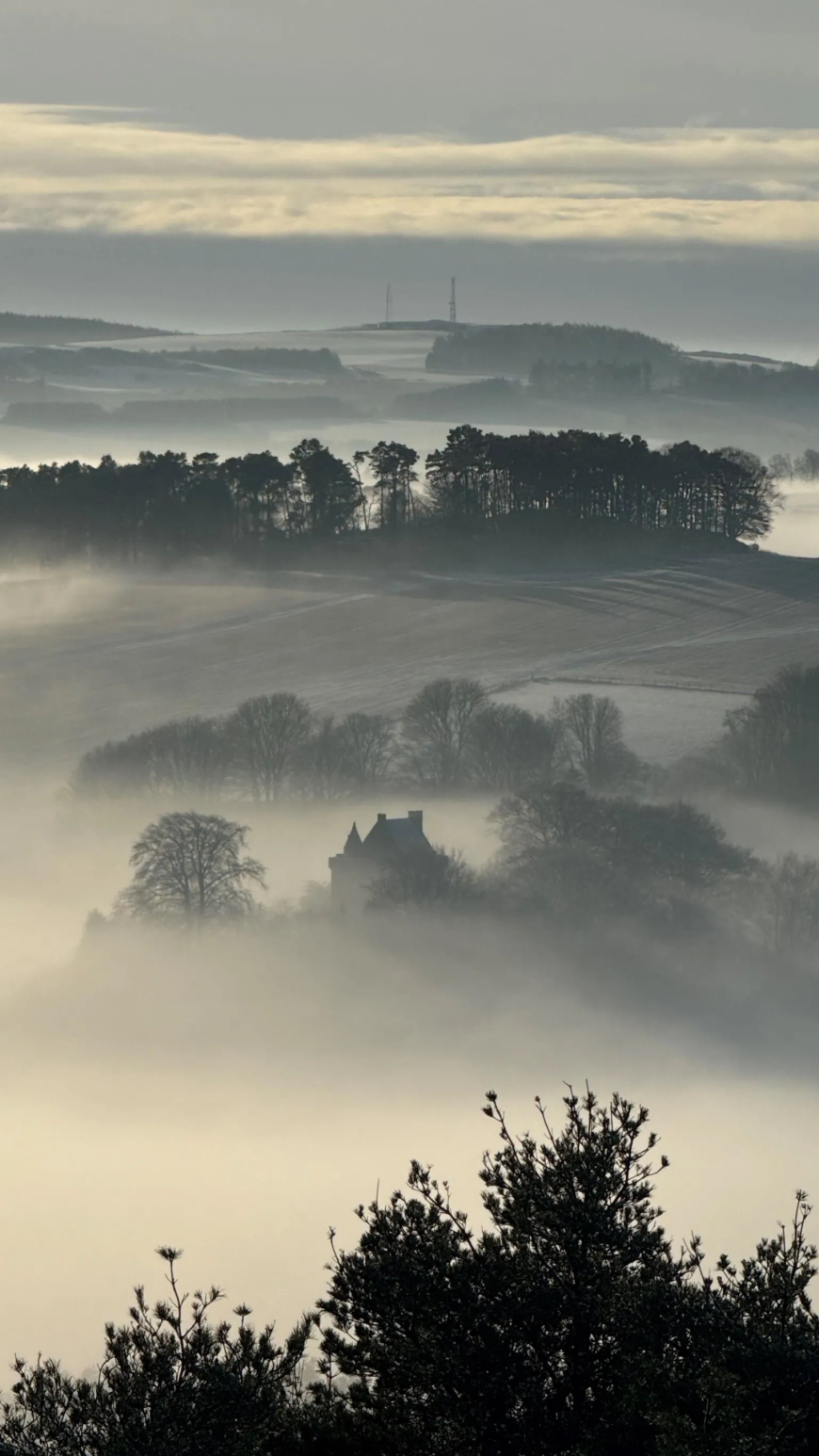 Somewhere in amongst the mist is Scotstarvit Tower in Cupar, photographed by David Auckland.