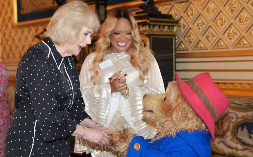 Marmalade sandwich, ma’am? Paddington meets the current Queen for first time