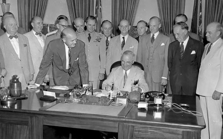 Truman signs national security law in Washington