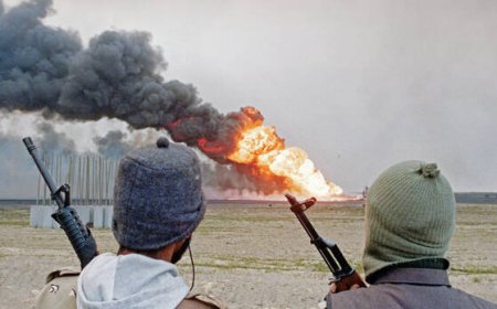 Iraqi armies invade Kuwait in massive regional conflict